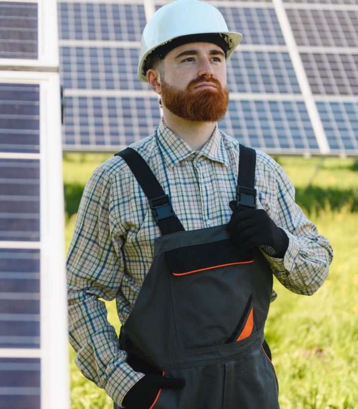 skilled-technician-installing-solar-panels-for-renewable-energy.jpg